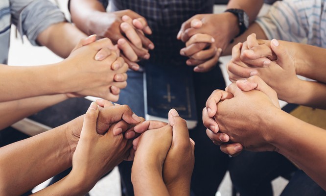 diverse hands holding hold hands circle to pray for God each other support together teamwork